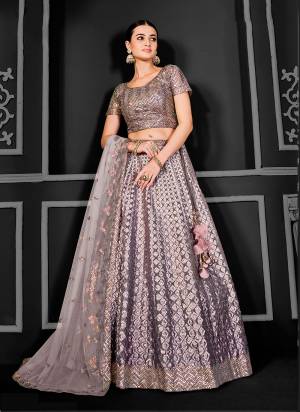 For A Designer Look,Grab These Lehenga Choli in Fine Colored.These Lehenga And Dupatta Are Fabricated On Net Pair With Net Blouse.Its Beautified With Designer Cord Floral Sequance Embroidery With Applique Work.