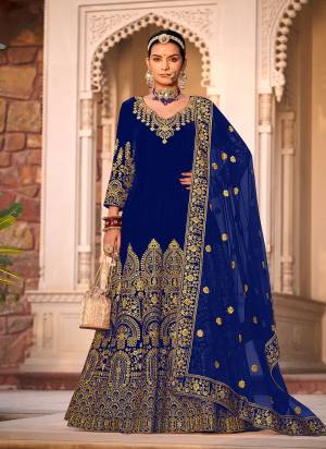 Garb These Anarkali Suit in Fine Colored Pair With Bottom And Dupatta.These Top Are Velvet And Dupatta Are Fabricated On Butterfly Net Pair With Micro Bottom.Its Beautified With Designer Heavy Jari Embroidery Work.