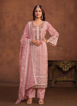 Garb These Party Wear Suit in Fine Colored Pair With Bottom And Dupatta.These Top And Dupatta Are Fabricated On Organza Pair With Santoon Bottom.Its Beautified With Santoon Inner.Its Beautified With Designer Heavy Thread,Sequance Embroidery Work.