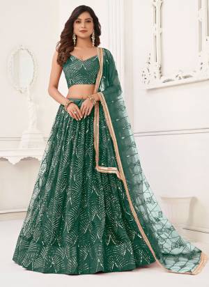 For A Different Look,Grab These Party Wear Designer Lehenga in All Over Pretty Colored Pair With Blouse And Dupatta.These Lehenga Choli And Dupatta is All Over Butterfly Net Base Fabric With Designer Thread,Sequance,Real Mirror Embroidery Work.