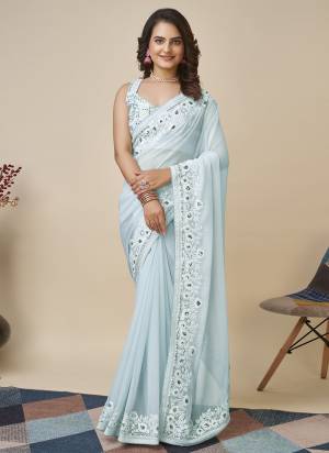 Attrective Look These Saree in Fine Colored.These Saree Are Georgette And Blouse is Art Silk Fabricated.Its Beautified With Designer Embroidery Work.