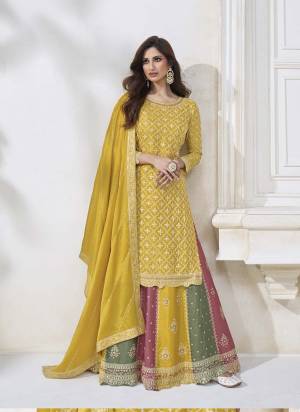 Garb These Designer Sharara Suits in Fine Colored Pair With Dupatta.These Top And Dupatta Are Fabricated On Chinon Pair With Chinon Bottom.Its Beautified With Heavy Designer Embroidery Work