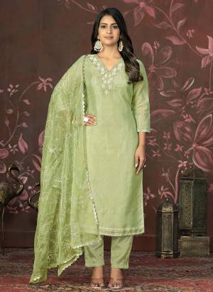 Garb These Suit in Fine Colored Pair With Bottom And Dupatta.These Top Are Simmer Cotton And Dupatta Are Fabricated On Organza Pair With Santoon Bottom.Its Beautified With Designer Hand Work.