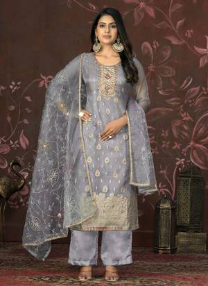 Garb These Suit in Fine Colored Pair With Bottom And Dupatta.These Top Are Organza And Dupatta Are Fabricated On Organza Pair With Santoon Bottom.Its Beautified With Wevon Designer, Hand Work.