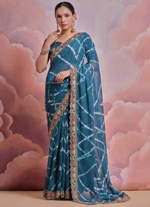 Grab These Festive Wear Saree in Fine Colored.These Saree is Fabricated On Georgette Pair With Mono Banglori Blouse.Its Beautified Designer Printed With Multy Thread,Sequance,Coding Work Lace Border With Blouse.