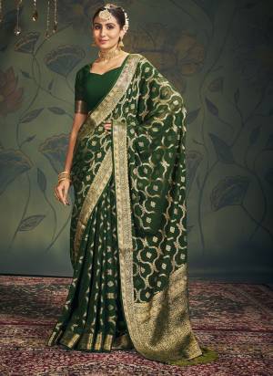 Grab These Saree in Fine Colored Pair With Blouse.These Saree and Blouse Are Fabricated On Georgette.Its Beautified With Heavy Wevon Designer.