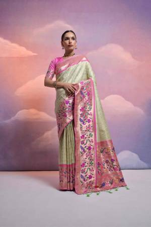 Attrective These Party Wear Fancy Saree in Fine Colored.These Saree And Blouse is Fabricated On Banarasi Silk.Its Beautified With Wevon Paithani Designer.