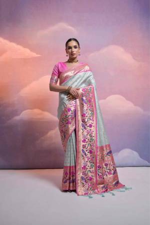 Attrective These Party Wear Fancy Saree in Fine Colored.These Saree And Blouse is Fabricated On Banarasi Silk.Its Beautified With Wevon Paithani Designer.