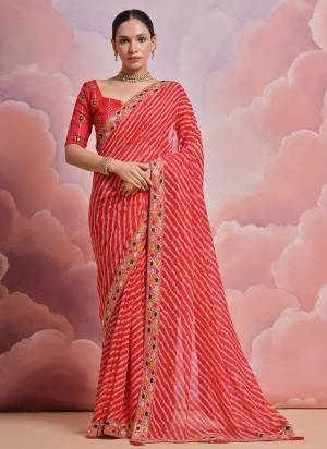 Looking These Festive Wear Saree in Fine Colored.These Saree is Fabricated On Georgette Pair With Mono Banglori Blouse.Its Beautified Designer Laheriya Printed With Multy Thread,Sequance,Coding Work Lace Border With Blouse.