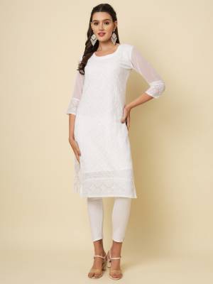 Garb These Beautiful Looking Readymade Long Kurti.These Kurti is Fabricated On Georgette With Crepe Inner.Its Beautified With Designer Chikankari Thread Embroidery Work.