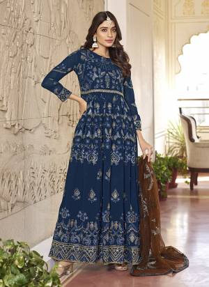 Attrective Looking These Anarkali Suit in Fine Colored Pair With Bottom And Dupatta.These Top Are Faux Georgette And Dupatta Are Fabricated On Net Pair With Dull Santoon Bottom.Its Beautified With Heavy Designer Sequance,Thread Embroidery Work.