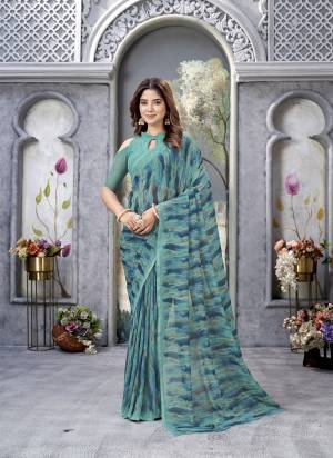 Garb These Printed Saree With Blouse in Fine Colored.These Saree And Blouse is Fabricated On Weight Less.Its Beautified With Designer Printed.