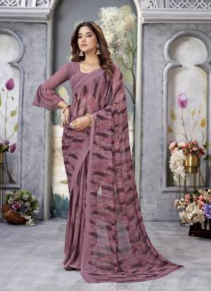 Garb These Printed Saree With Blouse in Fine Colored.These Saree And Blouse is Fabricated On Weight Less.Its Beautified With Designer Printed.