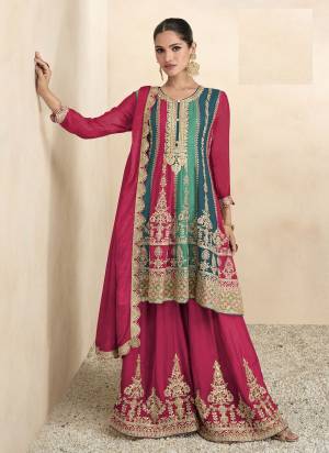 Garb These Designer Sharara Suits in Fine Colored Pair With Dupatta.These Top And Dupatta Are Fabricated On Chinon Pair With Chinon Bottom.Its Beautified With Designer Embroidery Work