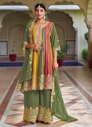 Attrective These Designer Sharara Suits in Fine Colored Pair With Dupatta.These Top And Dupatta Are Fabricated On Chinon Pair With Chinon Bottom.Its Beautified With Designer Embroidery Work