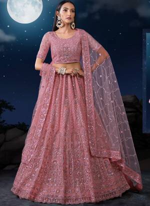 For A Designer Look,Grab These Lehenga Choli in Fine Colored.These Lehenga And Dupatta Are Fabricated On Soft Net Pair With Soft Net Blouse.Its Beautified With Heavy Designer Embroidery Work.