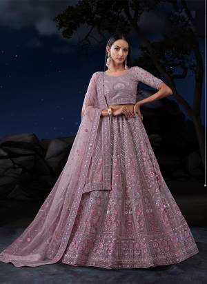 For A Designer Look,Grab These Lehenga Choli in Fine Colored.These Lehenga And Dupatta Are Fabricated On Soft Net Pair With Soft Net Blouse.Its Beautified With Heavy Designer Embroidery Work.