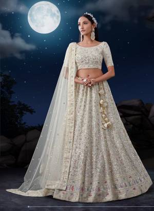 For A Designer Look,Grab These Lehenga Choli in Fine Colored.These Lehenga And Dupatta Are Fabricated On Soft Net Pair With Soft Net Blouse.Its Beautified With Heavy Designer Embroidery Work.