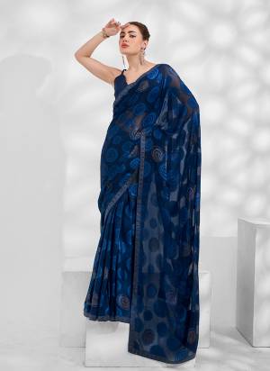 Garb These Fancy Saree in Fine Colored.These Saree Are Moss Chiffon And Blouse is Fabricated On Art Silk Pair.Its Beautified With Heavy Swarovski Work Jacquard Disigner.