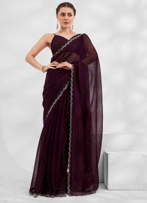 Attrective These Fancy Party Wear Saree in Fine Colored.These Saree Are Shimmer Chiffon And Blouse is Fabricated On Art Silk Pair.Its Beautified With Heavy Swarovski Work Disigner.