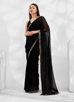 Attrective These Fancy Party Wear Saree in Fine Colored.These Saree Are Shimmer Chiffon And Blouse is Fabricated On Art Silk Pair.Its Beautified With Heavy Swarovski Work Disigner.