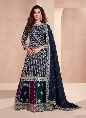 Garb These Designer Gharara Suits in Fine Colored Pair With Dupatta.These Top And Dupatta Are Fabricated On Chinon Pair With Chinon Bottom.Its Beautified With Designer Embroidery Work