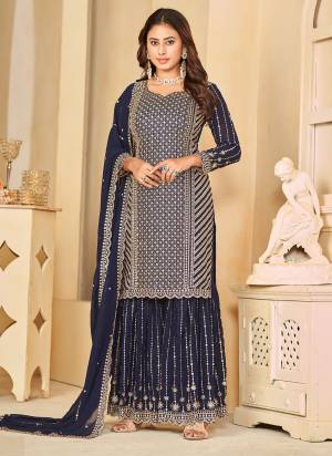 Looking These Designer Paty Wear Plazzo Suit in Fine Colored Pair With Bottom And Dupatta.These Top And Bottom Are Fabricated On Faux Georgette Pair With Faux Georgette Dupatta.Its Beautified With Santoon Inner.Its Beautified With Heavy Designr Sequance Embroidery Work.