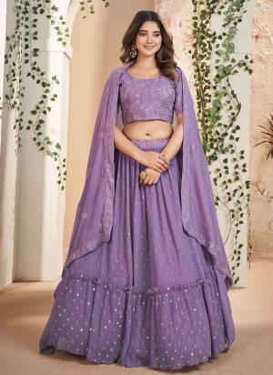 For A Designer Look,Grab These Lehenga Choli in Fine Colored.These Lehenga Are Faux Georgette And Dupatta Are Fabricated On Faux Georgette Pair With Faux Georgette Blouse.Its Beautified With Designer Thread,Sequance Embroidery Work.