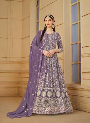 Garb These Party Wear Anarkali Suit in Fine Colored Pair With Bottom And Dupatta.These Top And Dupatta Are Fabricated On Faux Georgette Pair With Santoon Bottom.Its Beautified With Santoon Inner.Its Beautified With Designer Heavy Codding Embroidery Work.