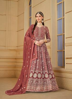 Garb These Party Wear Anarkali Suit in Fine Colored Pair With Bottom And Dupatta.These Top And Dupatta Are Fabricated On Faux Georgette Pair With Santoon Bottom.Its Beautified With Santoon Inner.Its Beautified With Designer Heavy Codding Embroidery Work.