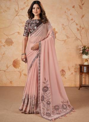 Look Attrective These Designer Party Wear Saree in Fine Colored.These Saree Are  Satin Crepe Silk And Blouse Melborn Silk is Fabricated.Its Beautified Heavy Designer Sequance Embroidery Work.