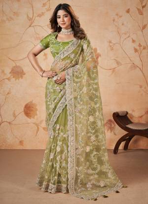 Look Attrective These Designer Party Wear Saree in Fine Colored.These Saree Are Net And Blouse Silk Slub is Fabricated.Its Beautified Heavy Designer Sequance Embroidery Work.