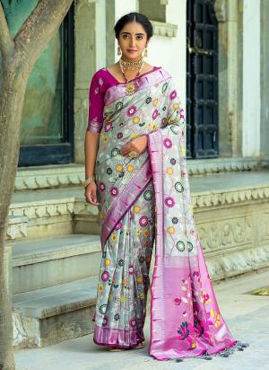 Garb These Party Wear Fancy Saree in Fine Colored.These Saree And Blouse is Fabricated On Banarasi Silk.Its Beautified With Wevon Paithani Meenakari Jacquard Designer.