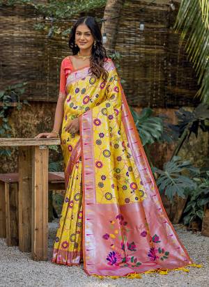 Garb These Party Wear Fancy Saree in Fine Colored.These Saree And Blouse is Fabricated On Banarasi Silk.Its Beautified With Wevon Paithani Meenakari Jacquard Designer.