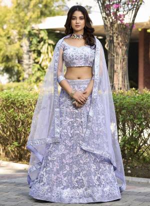 A Designer Look,Grab These  Lehenga Choli in Fine Colored.These Lehenga And Blouse Are Net And Dupatta Are Fabricated On Net.Its Beautified With Designer Embroidery Work.