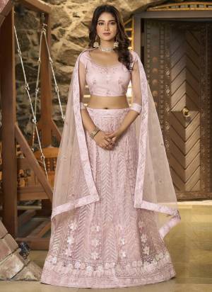 A Designer Look,Grab These  Lehenga Choli in Fine Colored.These Lehenga And Blouse Are Net And Dupatta Are Fabricated On Net.Its Beautified With Designer Embroidery Work.