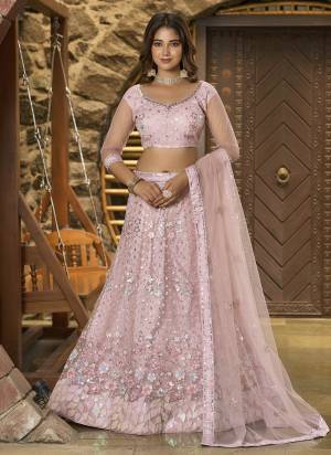 A Designer Look,Grab These  Lehenga Choli in Fine Colored.These Lehenga And Blouse Are Net And Dupatta Are Fabricated On Net.Its Beautified With Designer Embroidery Work.