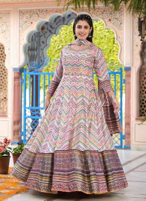 For A Designer Look,Grab These Readymade Gown With Dupatta in Fine Colored.These Gown Are Fabricated On Dola Silk Pair With Chinon Dupatta.Its Beautified With Designer Digital Printed With Hand Work.