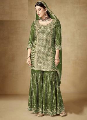 Garb These Designer Sharara Suits in Fine Colored Pair With Dupatta.These Top And Dupatta Are Fabricated On Chinon Pair With Chinon Bottom.Its Beautified With Blomming Color,Designer Sequance Embroidery Work