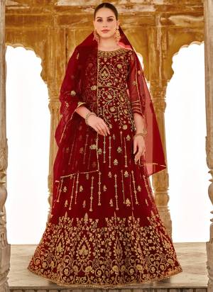 Garb These Anarkali Suit in Fine Colored Pair With Bottom And Dupatta.These Top Are Butterfly Net And Dupatta Are Fabricated On Butterfly Net Pair With Japan Satin Bottom.Its Beautified With Designer Heavy Jari Embroidery With Stone Work.