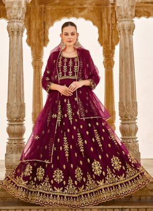 Garb These Anarkali Suit in Fine Colored Pair With Bottom And Dupatta.These Top Are Butterfly Net And Dupatta Are Fabricated On Butterfly Net Pair With Japan Satin Bottom.Its Beautified With Designer Heavy Jari Embroidery With Stone Work.