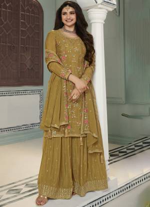 Garb These Designer Sharara Suits in Fine Colored Pair With Dupatta.These Top And Dupatta Are Fabricated On Chinon Pair With Chinon Bottom.Its Beautified With Blomming Color,Designer Thread,Sequance Embroidery Work