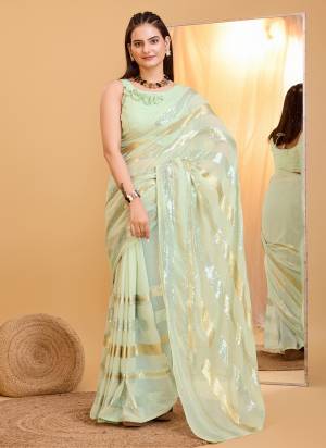 Garb These Party Wear Saree in Fine Colored.These Saree Are Georgette And Blouse is Art Silk Fabricated.Its Beautified With Designer Sequance Embroidery Work.