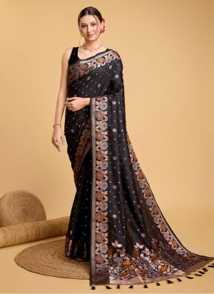 Attrective This Partywear Saree Paired With Blouse.This Saree And Blouse Are Silk Based Fabric With Weaving Jacquard Jari Designer. Buy This Pretty Saree Now.