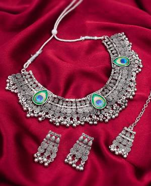 Attrective These Beautifil Oxidised Silver Colored Necklace.These Necklace is Come Alloy Material And Beautified With Artificial Stone And Beads Work.