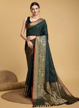 Attrective This Partywear Saree Paired With Blouse.This Saree And Blouse Are Soft Silk Based Fabric With Weaving Jacquard Double Jari Chex Designer. Buy This Pretty Saree Now.