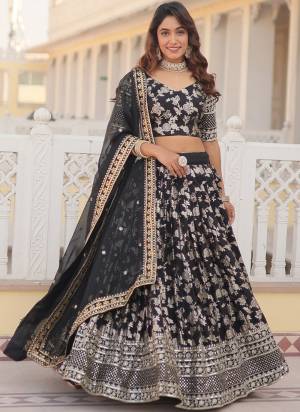 For A Designer Look,Grab These Lehenga Choli in Fine Colored.These Lehenga And Blouse Are Fabricated On Viscoce Jacquard Pair With Russion Silk Dupatta.Its Beautified With Designer Sequance Embroidery Work.