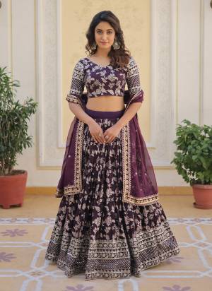 For A Designer Look,Grab These Lehenga Choli in Fine Colored.These Lehenga And Blouse Are Fabricated On Viscoce Jacquard Pair With Russion Silk Dupatta.Its Beautified With Designer Sequance Embroidery Work.