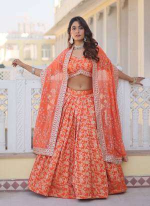 For A Designer Look,Grab These Lehenga Choli in Fine Colored.These Lehenga And Blouse Are Fabricated On Viscoce Jacquard Pair With Russion Silk Dupatta.Its Beautified With Wevon Designer With Sequance Embroidery Work.