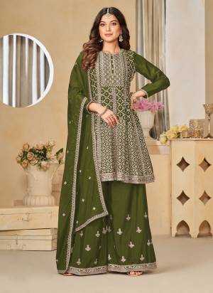 Looking These Designer Paty Wear Plazzo Suit in Fine Colored Pair With Bottom And Dupatta.These Top And Dupatta Are Fabricated On Chinon Pair With Santoon Bottom.Its Beautified With Santoon Inner.Its Beautified With Heavy Designr Sequance,Jari Embroidery Work.